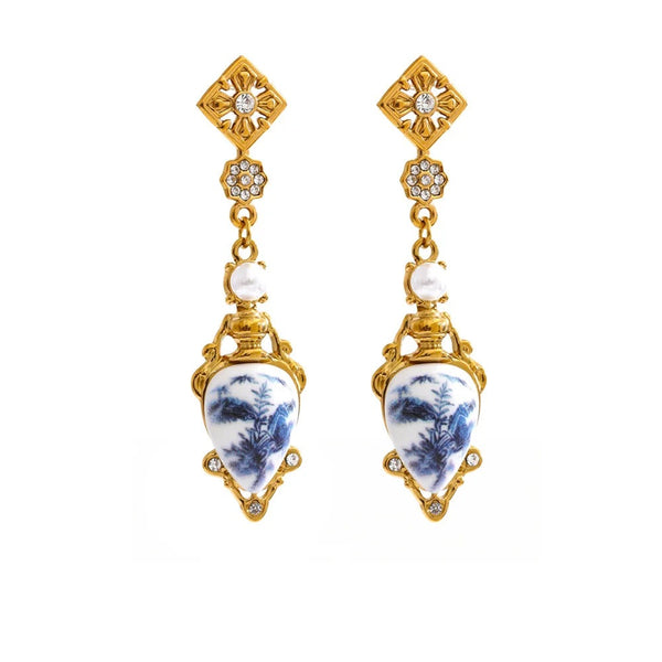 Gold-plated stainless steel earrings with resin.