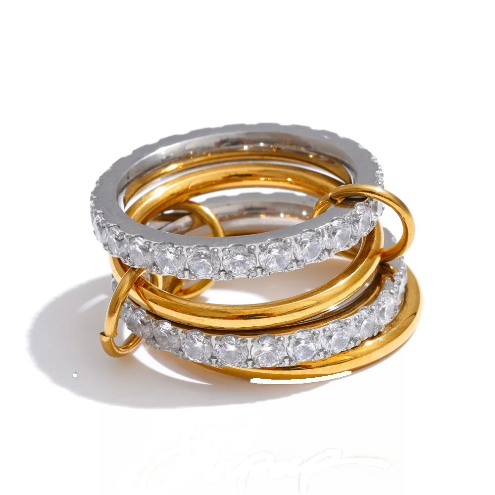 Gold-plated stainless steel ring with cubic zirconia stones.