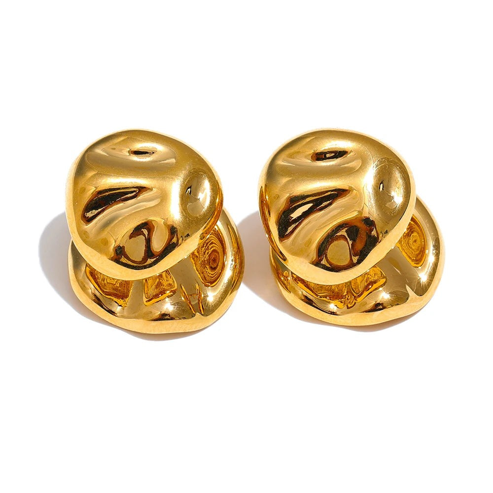 Gold-plated stainless steel earrings featuring a unique design resembling a musical note.