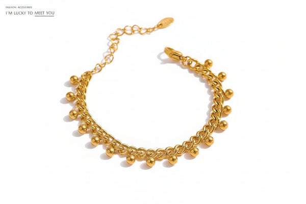 Gold bracelet with beads.