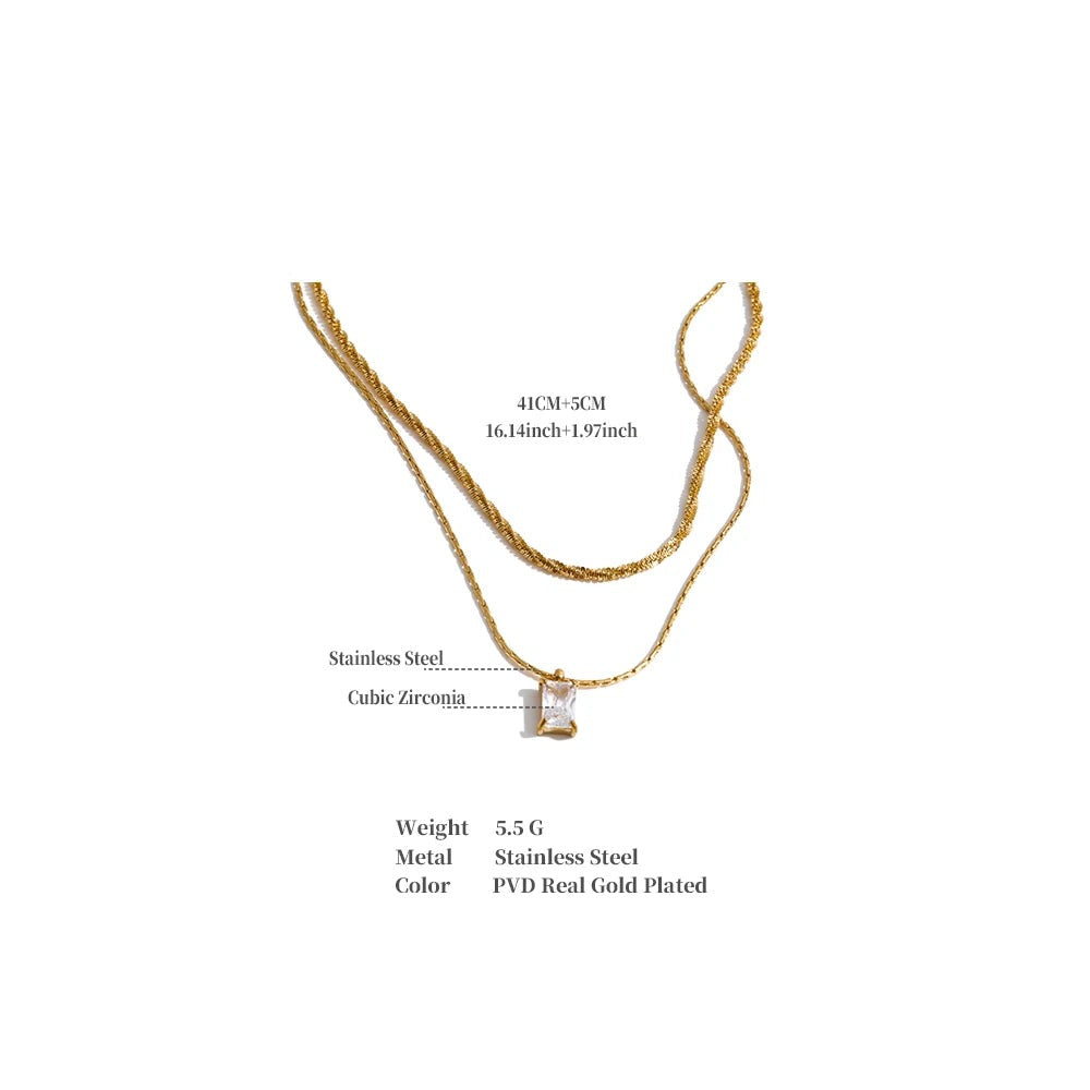 Cubic zirconia geometric chain necklace in gold-plated stainless steel with cubic zirconia.