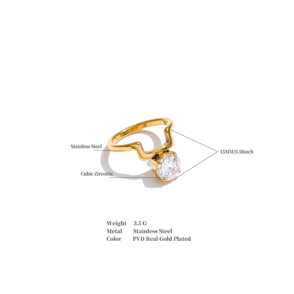 Cubic zirconia geometric ring in 18K gold-plated stainless steel with cubic zirconia.