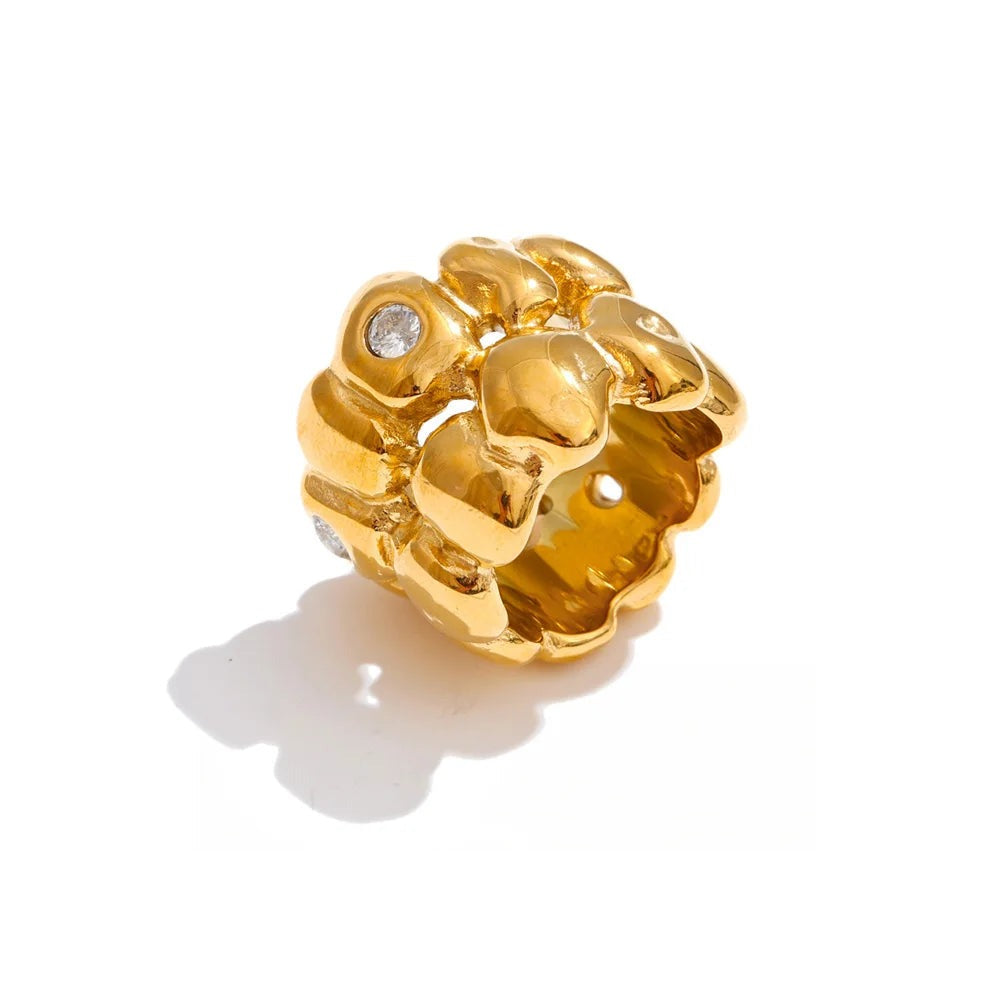 Gold-plated ring with cubic zirconia.
