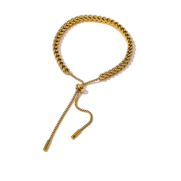 Gold-plated stainless steel bracelet with a key ring.