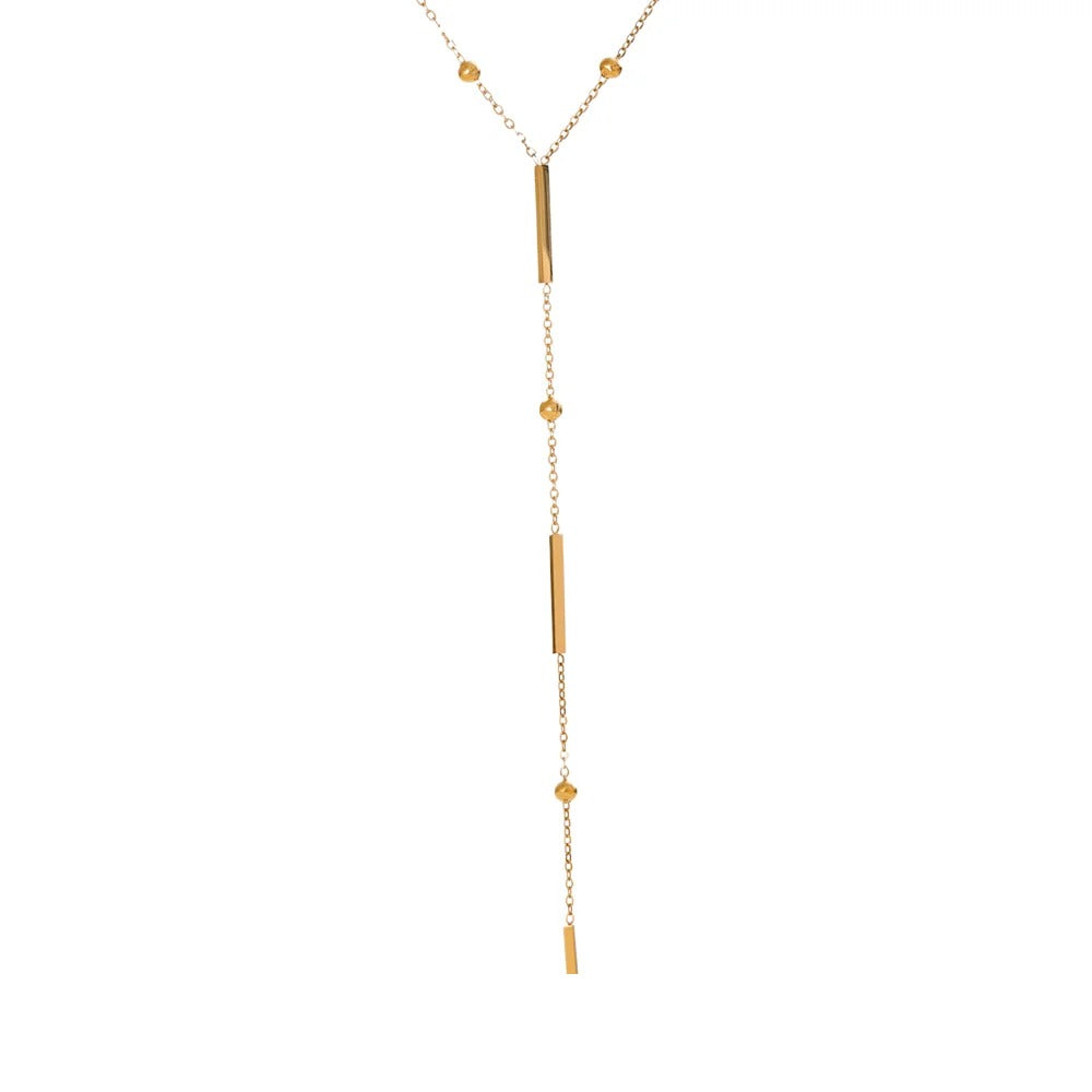 Gold-plated necklace with a long pendant.