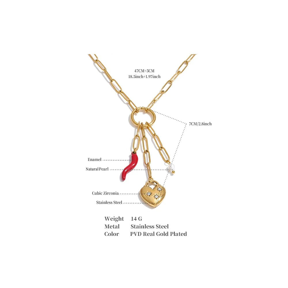 Cubic zirconia freshwater pearl heart necklace in gold-plated stainless steel with freshwater pearl and cubic zirconia.