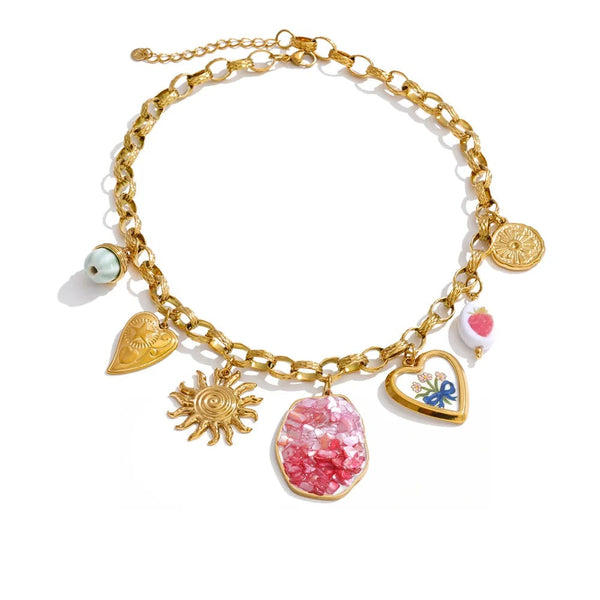 Gold-plated necklace with shell and resin charms.