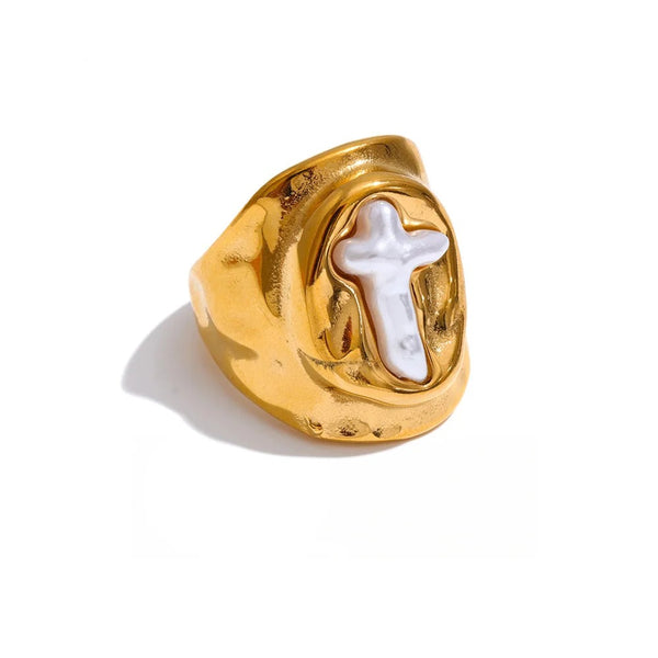 Gold-plated ring with pearl accents.