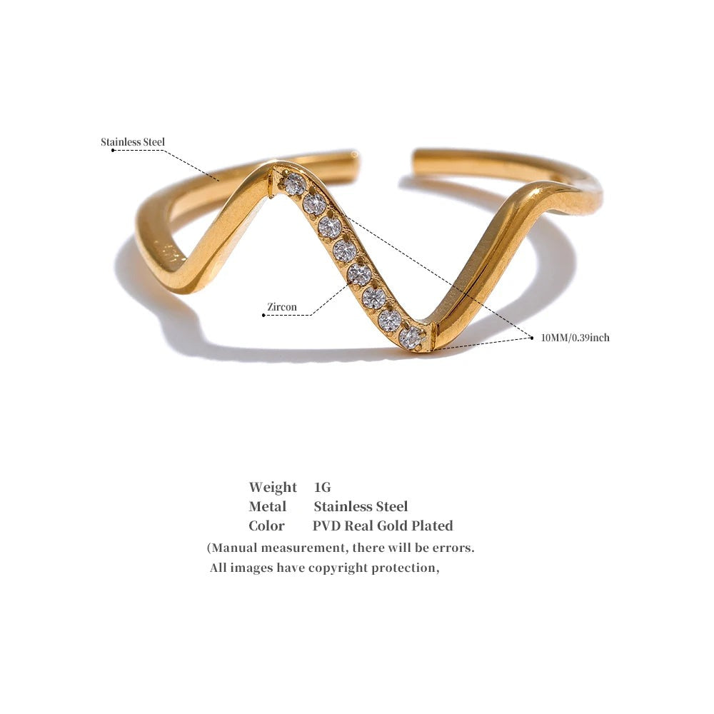 Cubic zirconia geometric ring in 18K gold-plated stainless steel with cubic zirconia.