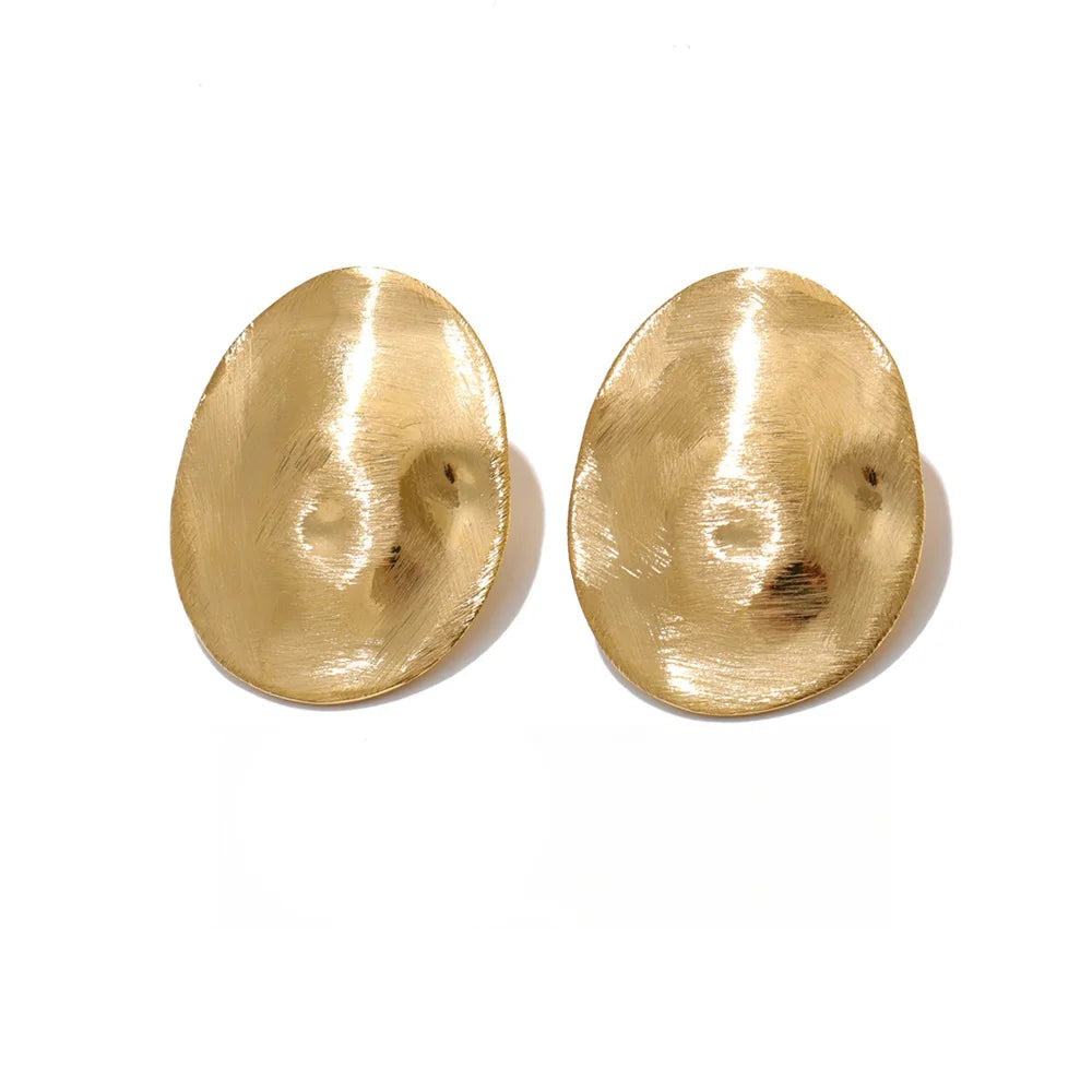 Gold-plated stainless steel earrings with a unique, oval shape.