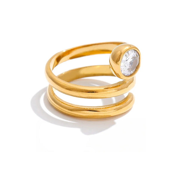 Gold-plated stainless steel ring with cubic zirconia.