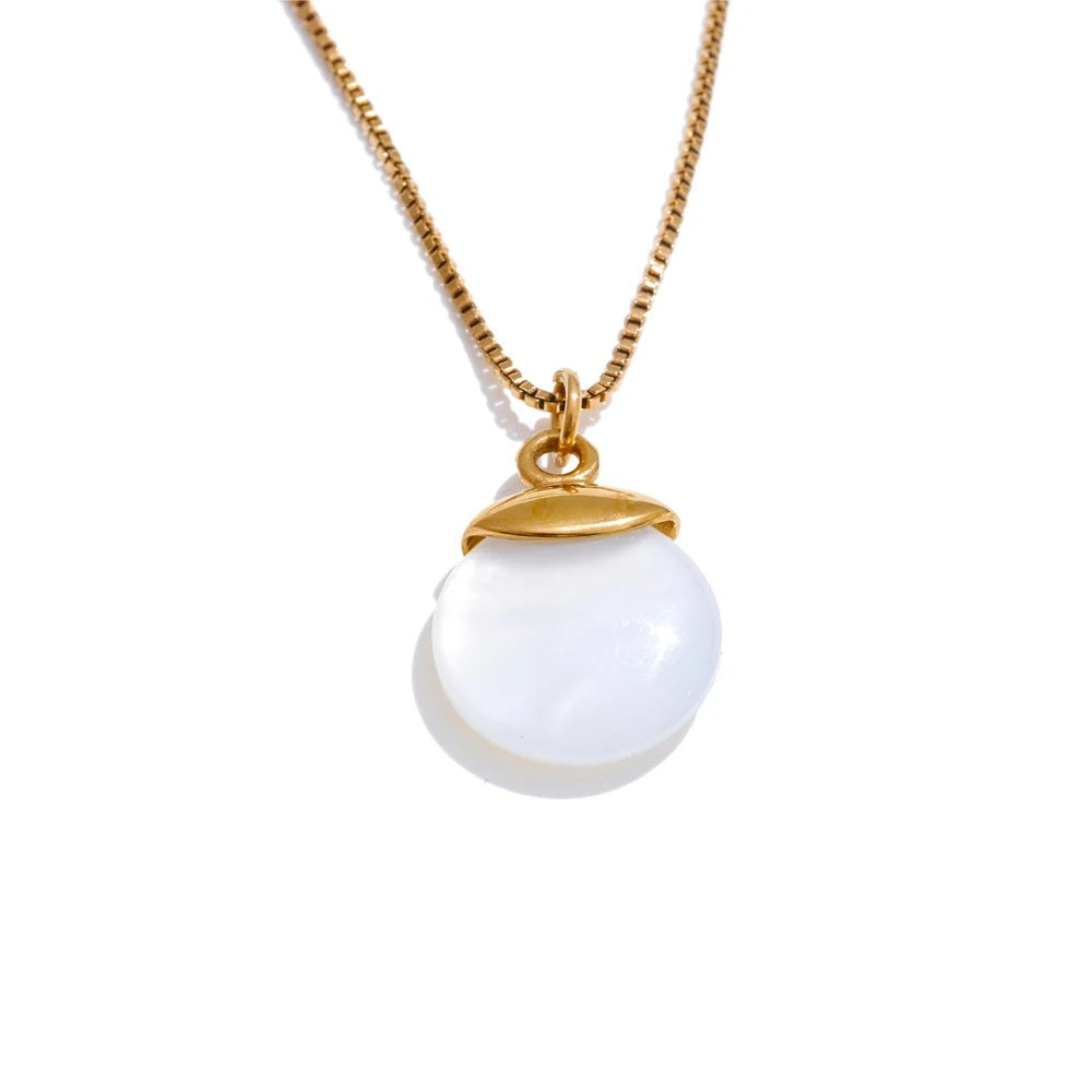 Gold-plated stainless steel necklace with white marble pendant.