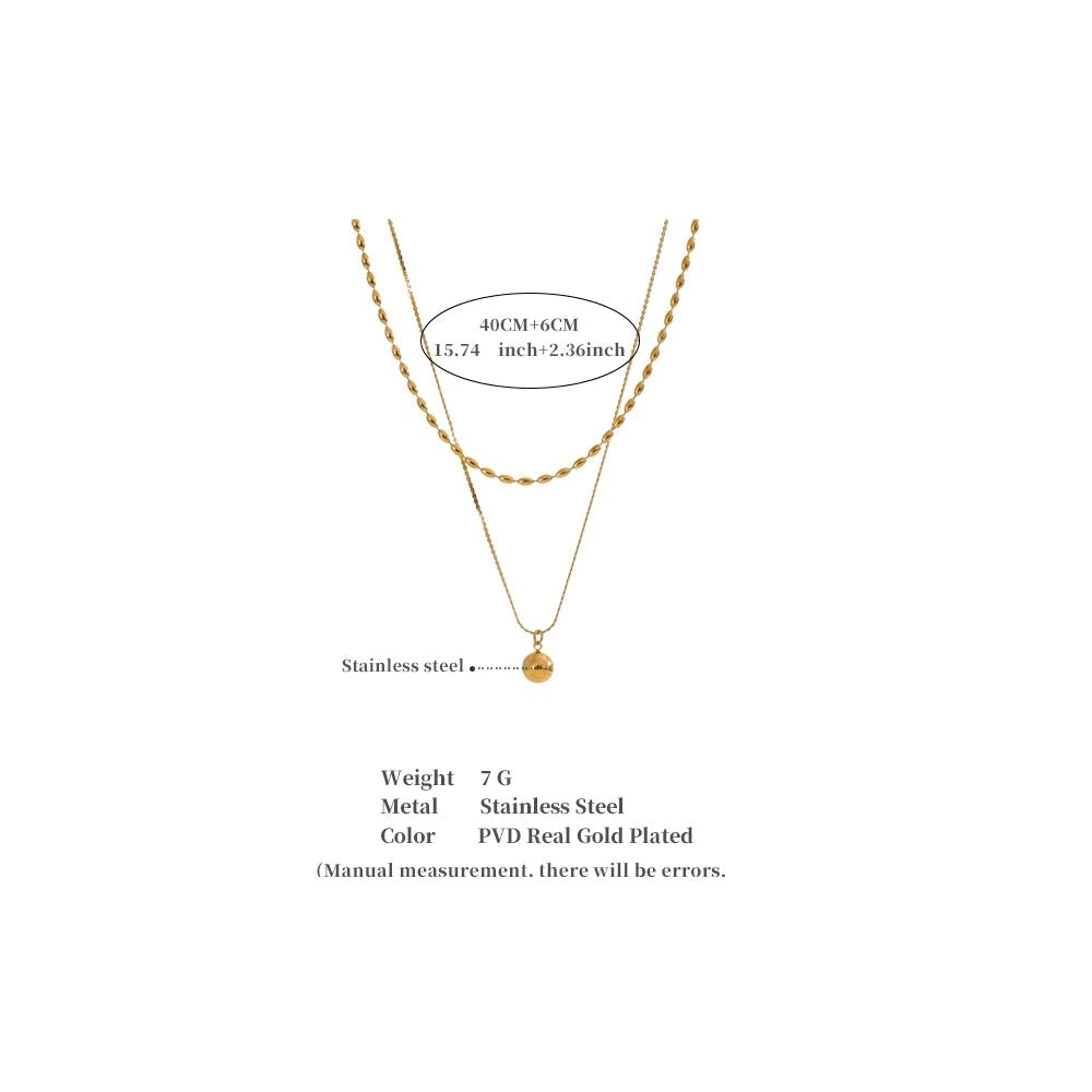 Geometric chain layered necklace in gold-plated stainless steel.