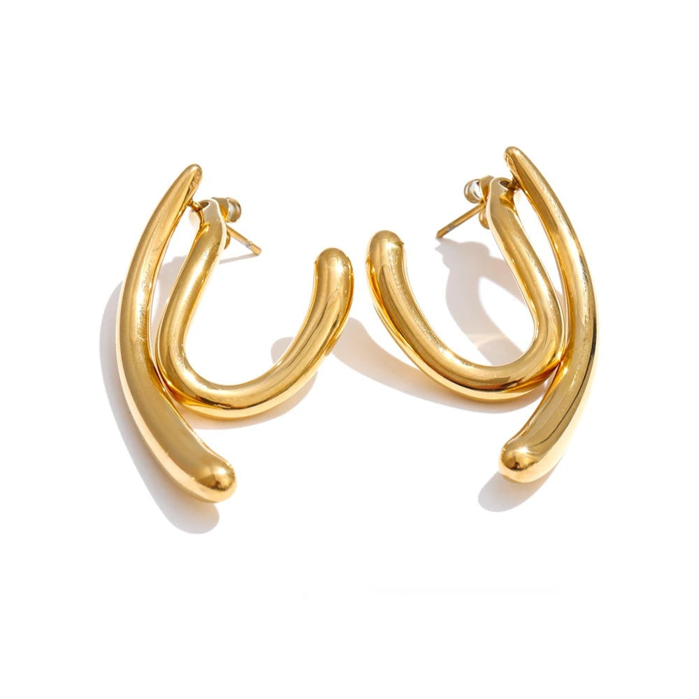 Gold-plated stainless steel earrings featuring a large hoop design.