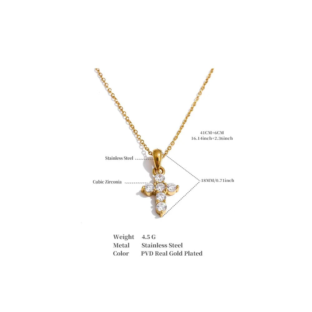 Cubic zirconia cross necklace in gold-plated stainless steel with cubic zirconia.