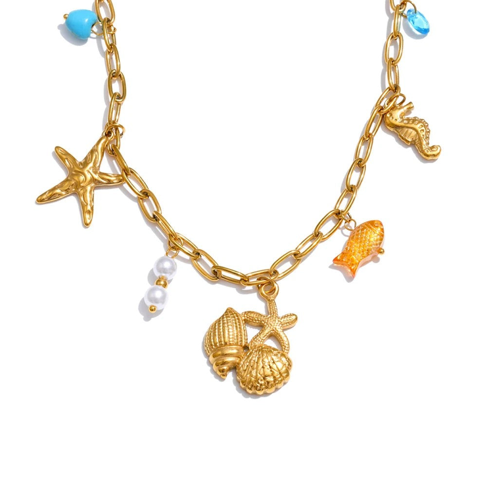 Gold-plated stainless steel necklace with pearls and shells.