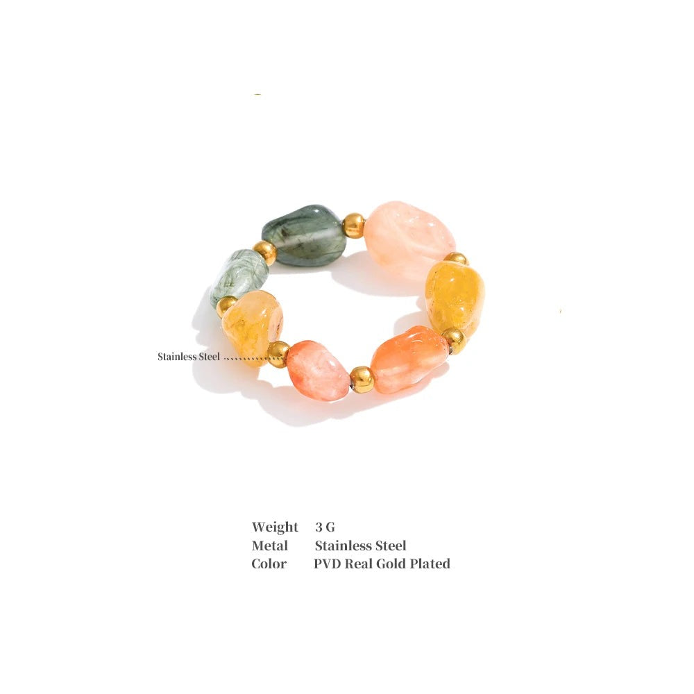 Natural stone geometric ring in 18K gold-plated stainless steel with natural stone.
