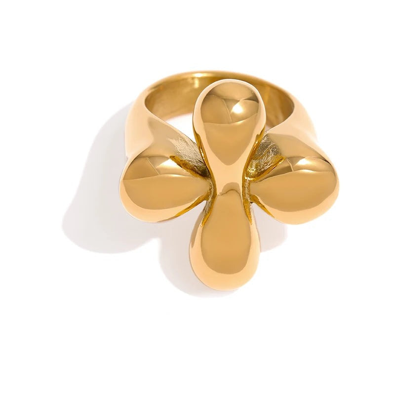 Gold-plated stainless steel ring with a flower design.