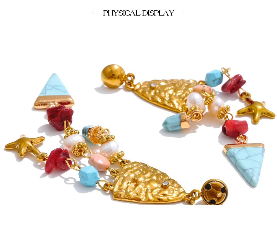 Freshwater pearl resin geometric earrings in gold-plated 316L stainless steel with freshwater pearl and resin.
