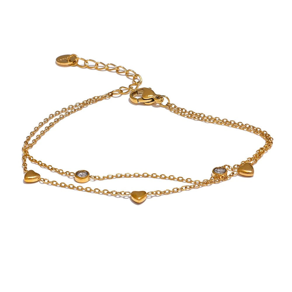 Gold-plated bracelet with cubic zirconia stones.