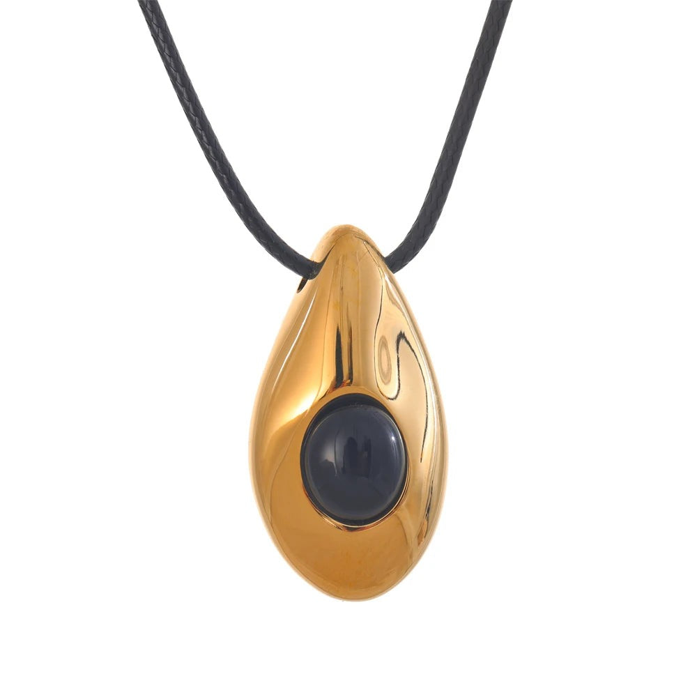 Gold-plated stainless steel necklace with a large black stone pendant.