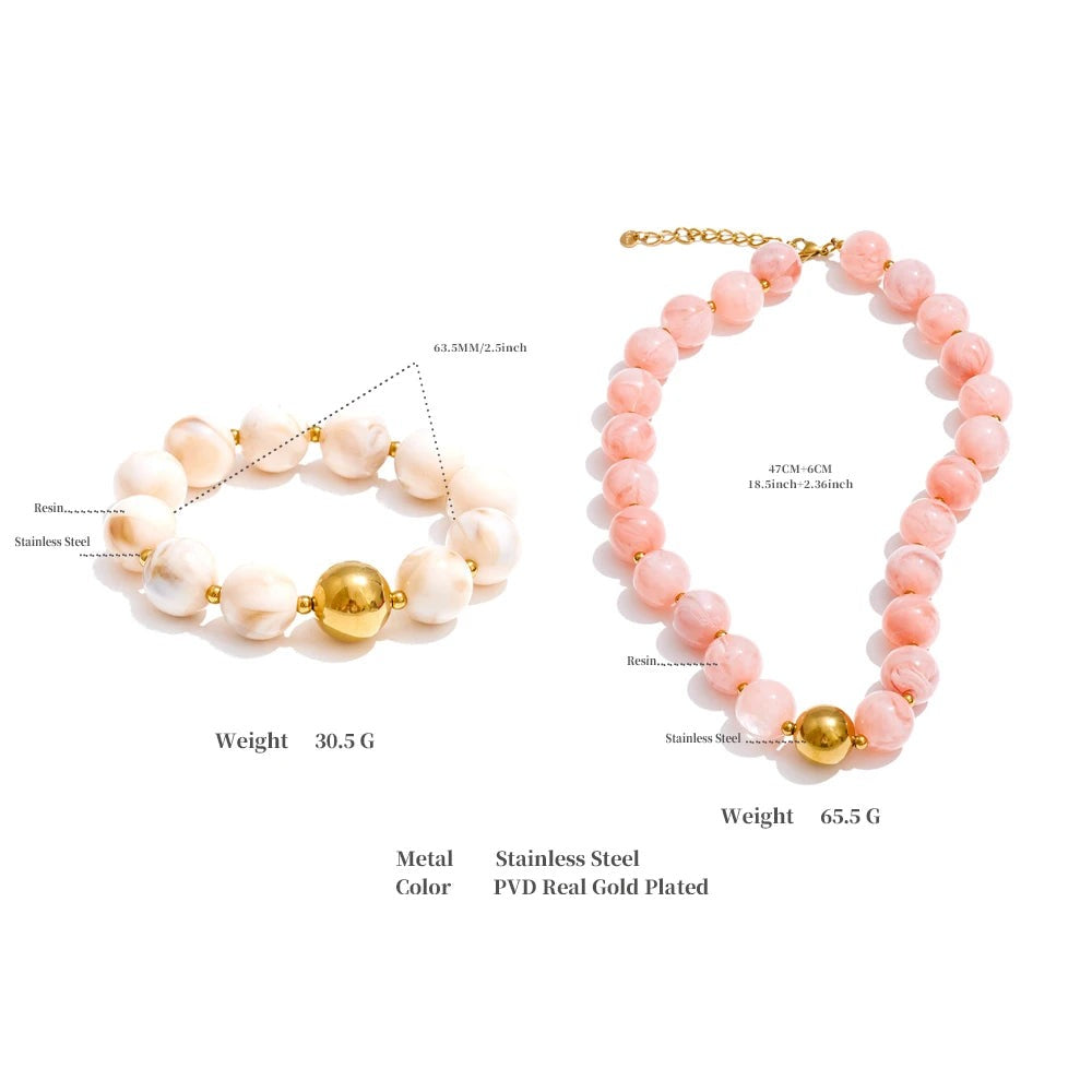 Resin beaded multi-color necklace in gold-plated stainless steel with resin.
