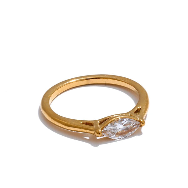 Gold-plated stainless steel ring with cubic zirconia.