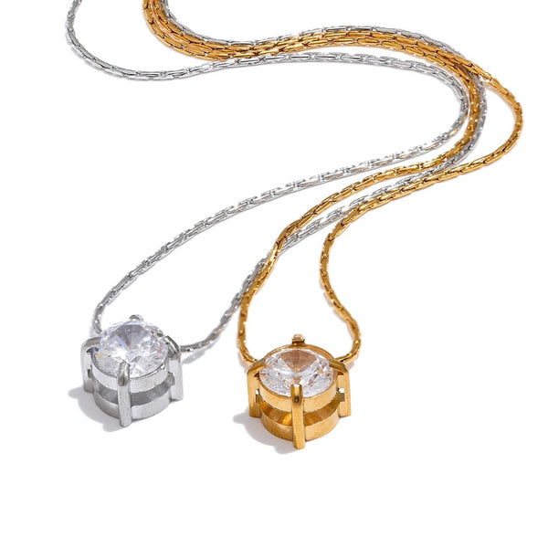 Gold-plated stainless steel necklace with cubic zirconia stones.