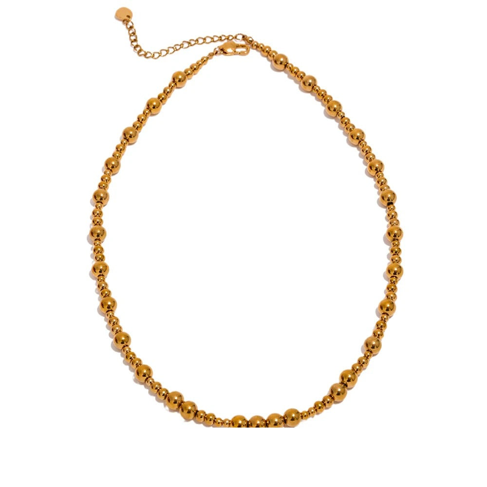 Gold-plated stainless steel necklace with a large bead.