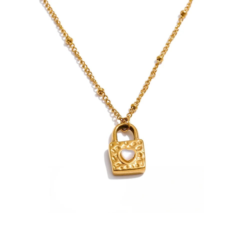 Gold-plated stainless steel necklace with a heart-shaped pendant.