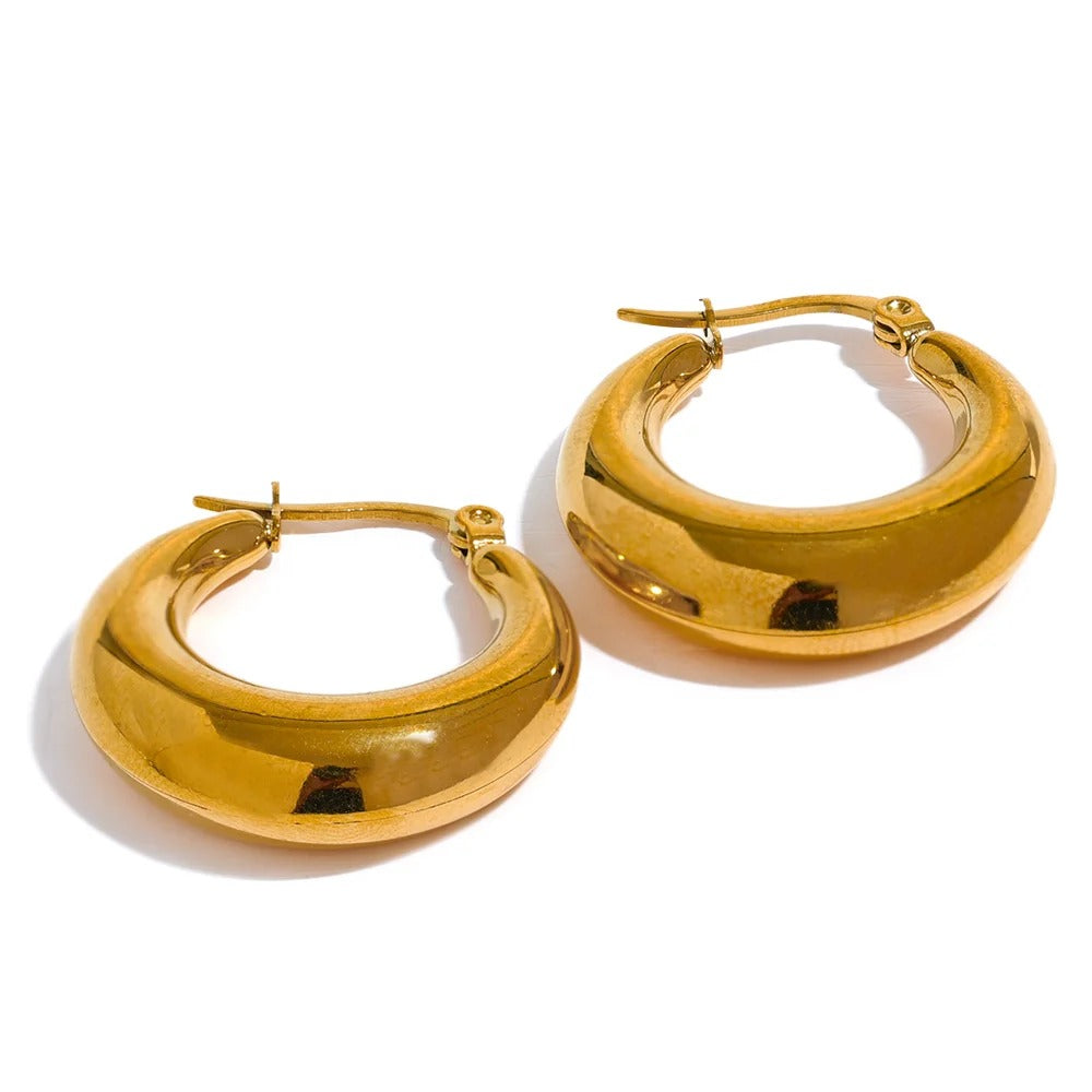 Gold-plated stainless steel hoop earrings.