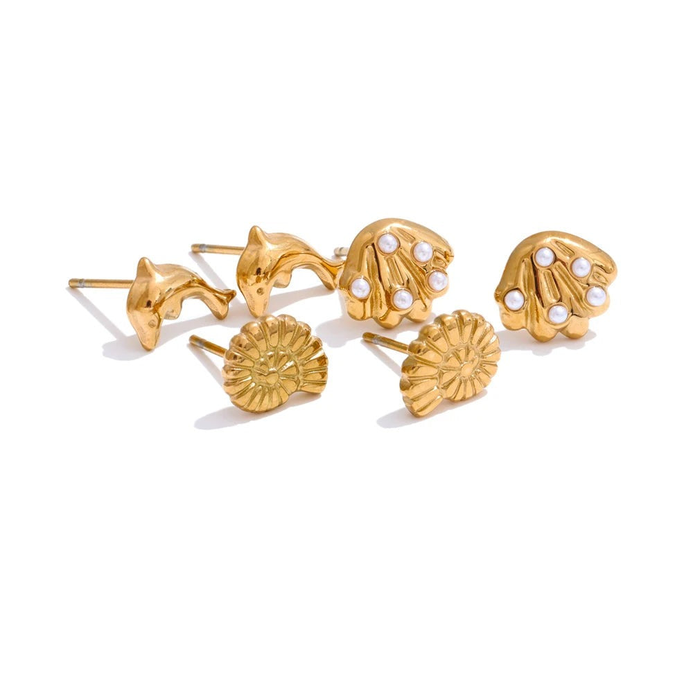 Gold-plated stainless steel earrings with pearl and shell accents.