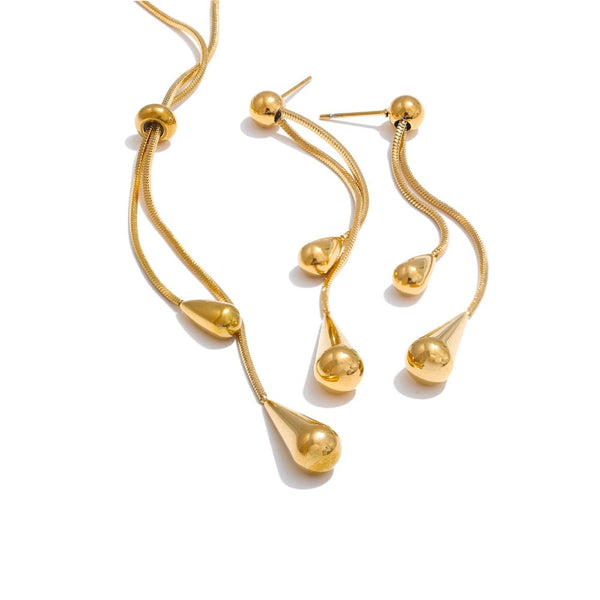 Gold-plated stainless steel earrings with spherical beads.