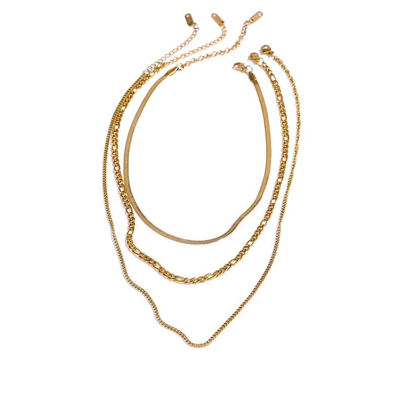 Gold-plated stainless steel necklace with multiple chains.