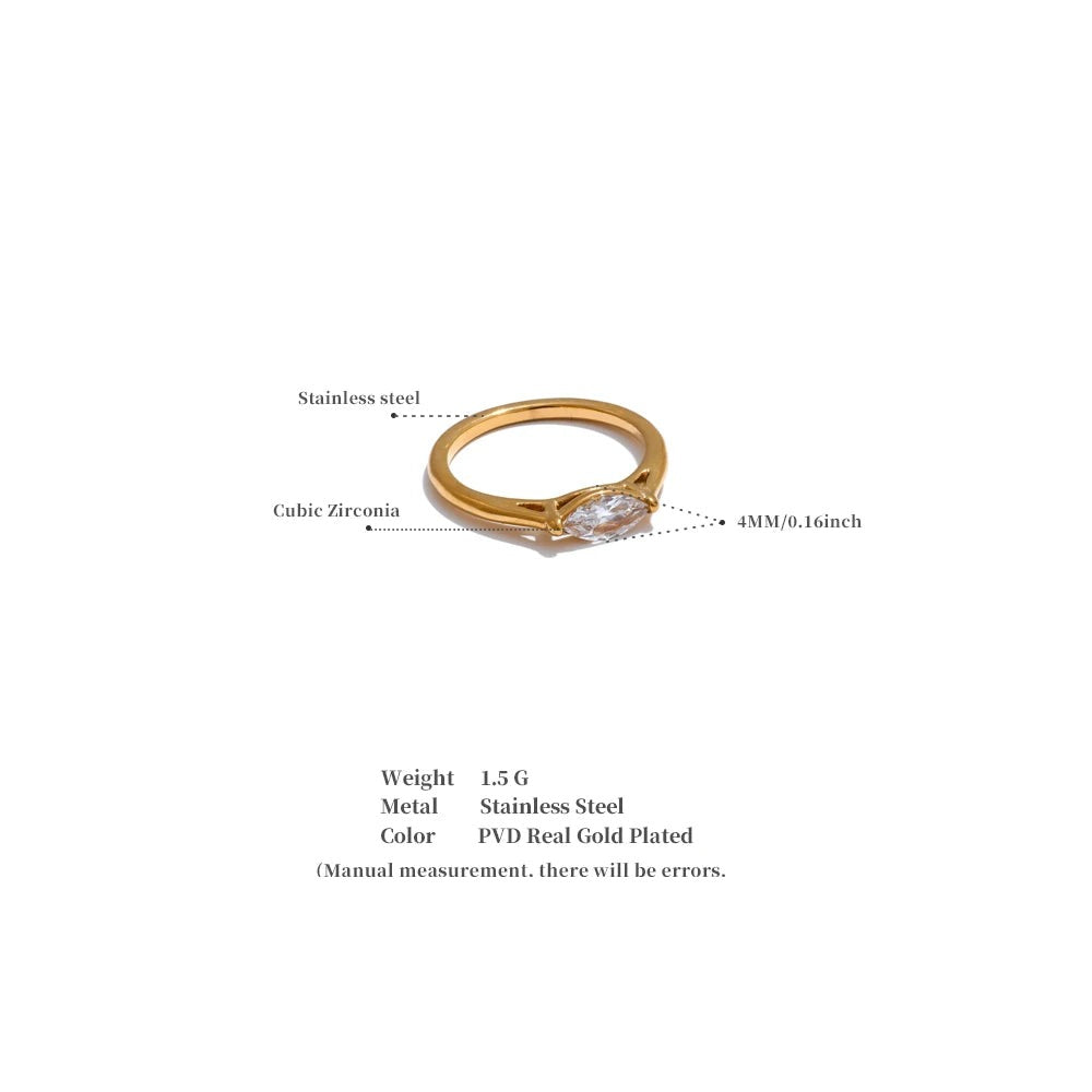 Cubic zirconia geometric ring in 18K gold-plated stainless steel with cubic zirconia.