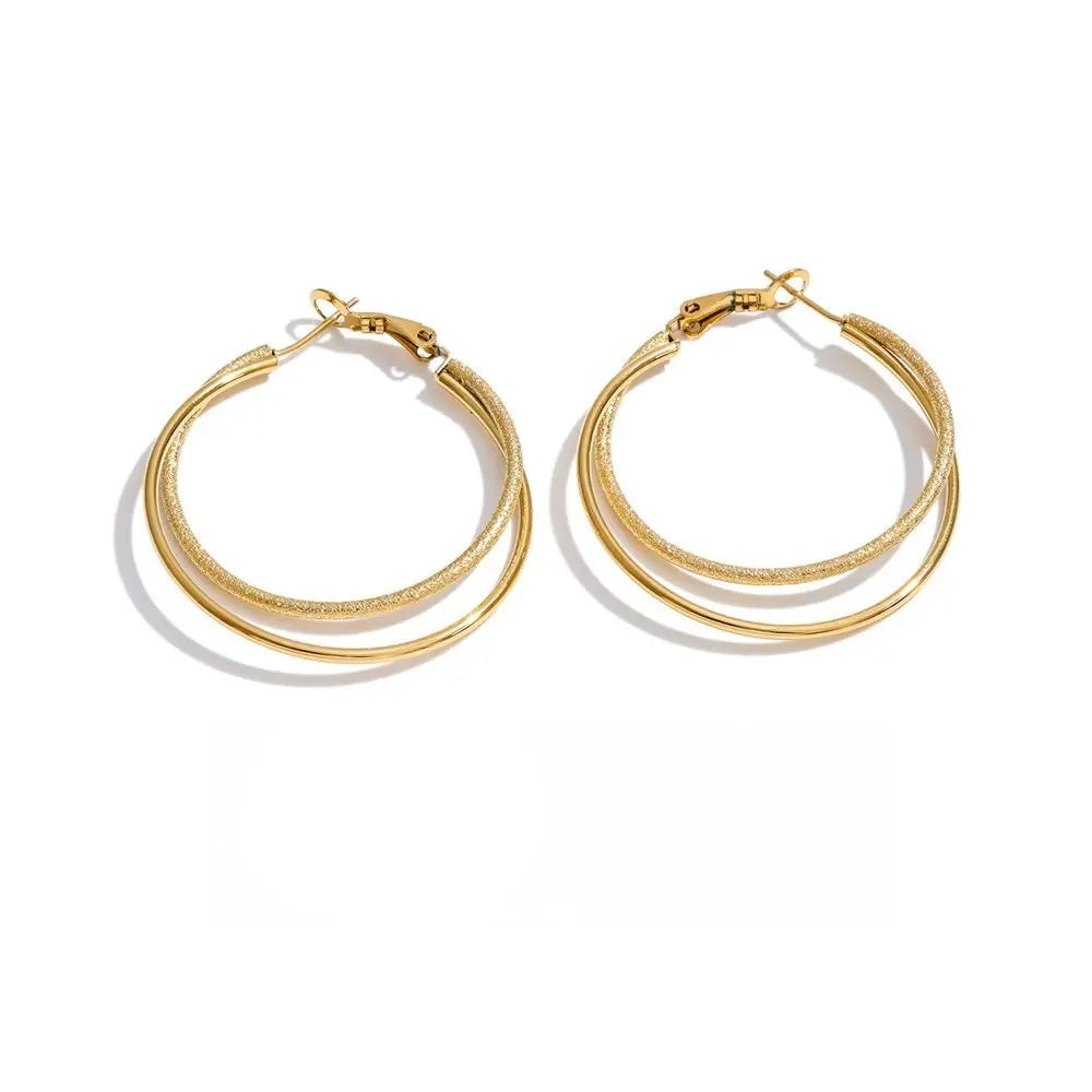 Gold-plated stainless steel hoop earrings with a simple design.