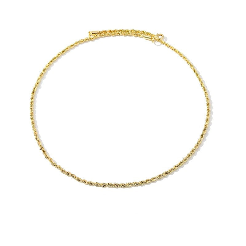 Minimalist geometric chain necklace in gold-plated stainless steel.