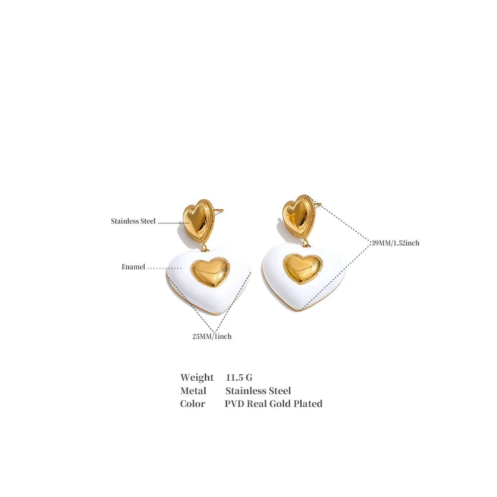 White enamel heart earrings in gold-plated stainless steel with enamel.