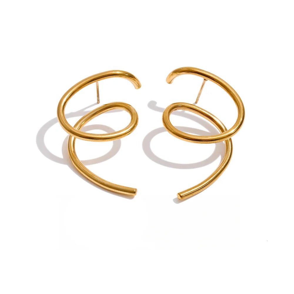 Gold-plated stainless steel hoop earrings with a large circular design on each side.