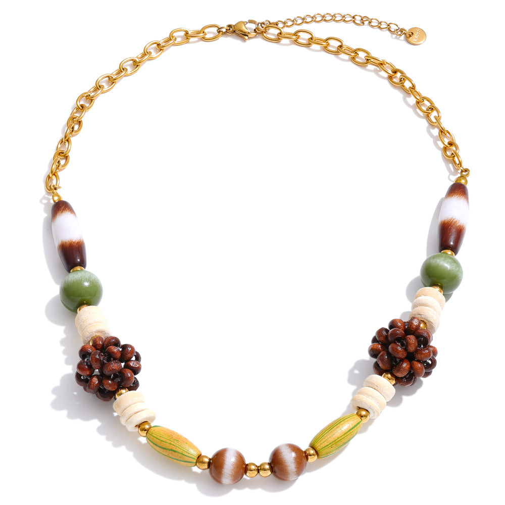 Gold-plated stainless steel necklace with beads in shades of brown and green.
