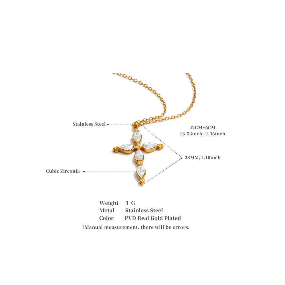 Cubic zirconia cross necklace in gold-plated stainless steel with cubic zirconia.