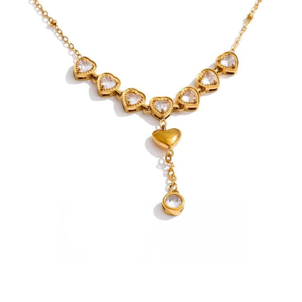 Gold-plated stainless steel necklace with cubic zirconia stones and a heart pendant.