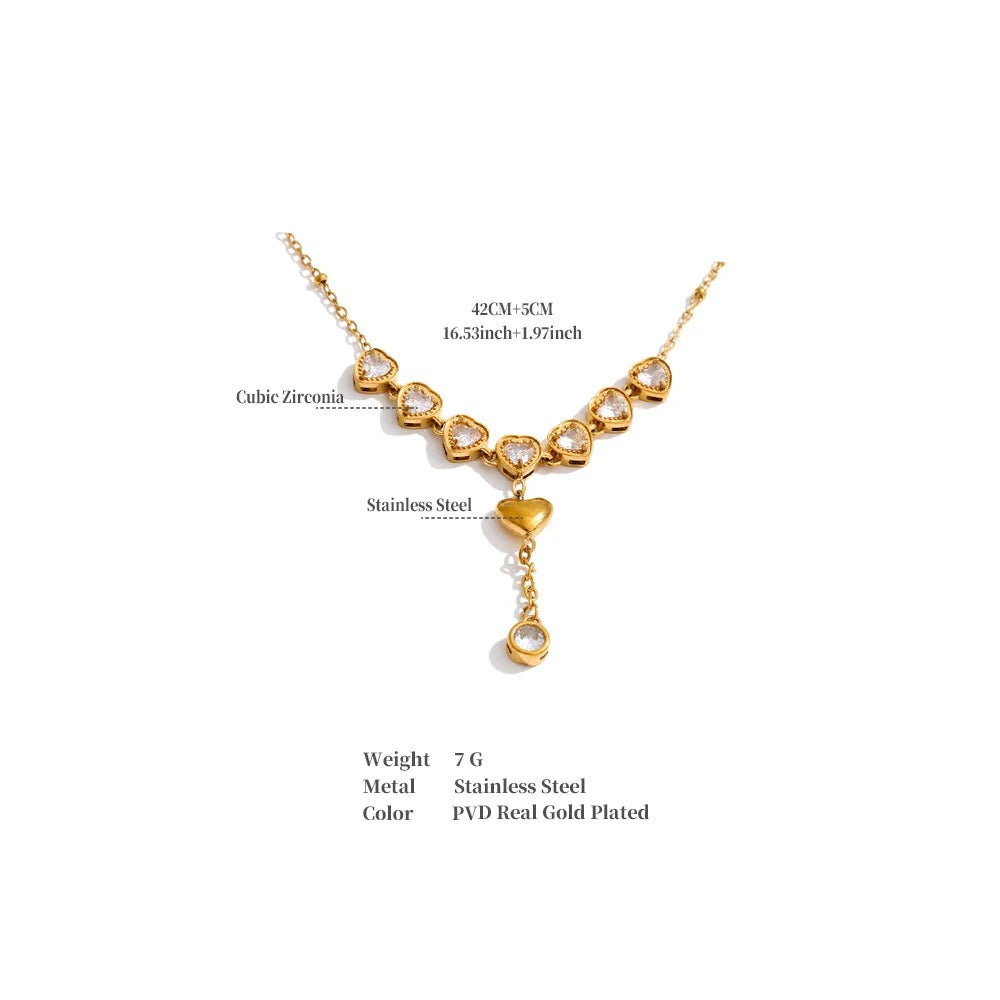 Cubic zirconia heart necklace in gold-plated stainless steel with cubic zirconia.