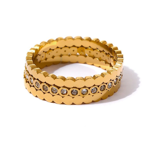 Gold-plated ring with cubic zirconia stones.