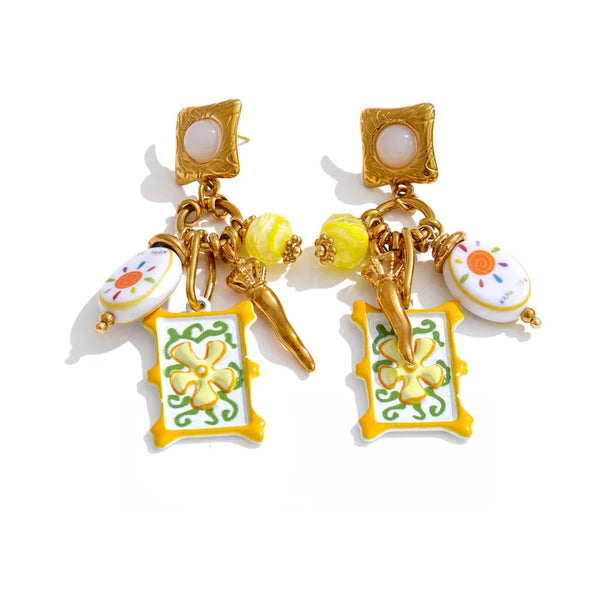 Gold-plated stainless steel earrings with enamel detailing.