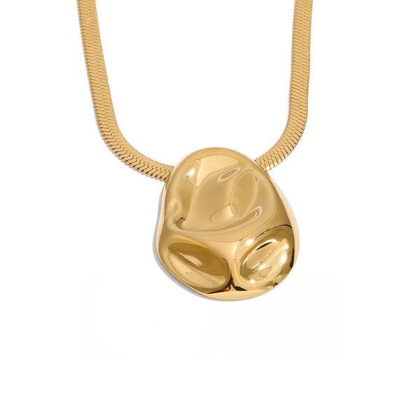 Gold-plated stainless steel necklace featuring a unique pendant shaped like a face.