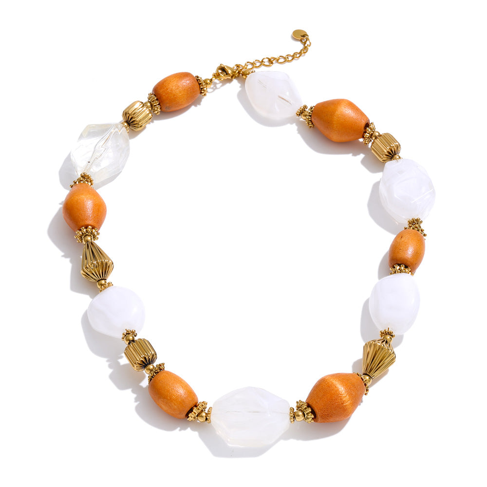 Resin beaded geometric necklace in gold-plated stainless steel with resin.