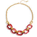 Resin geometric chain necklace in gold-plated stainless steel with resin.