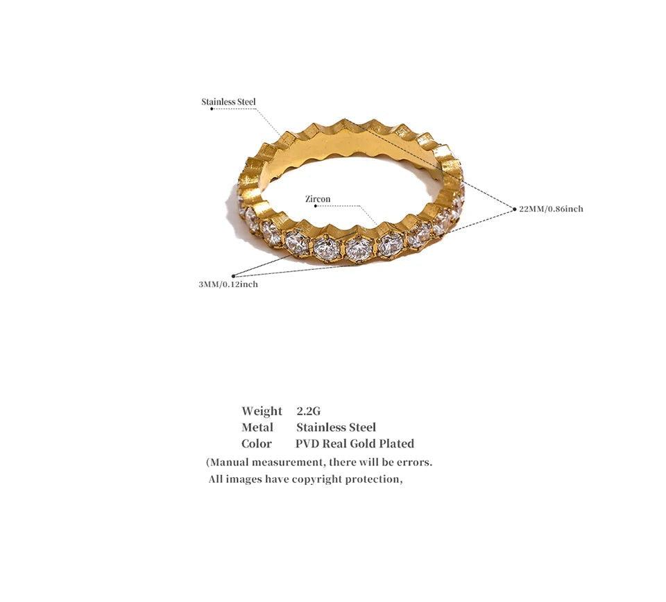 White cubic zirconia geometric ring in gold-plated stainless steel with cubic zirconia.