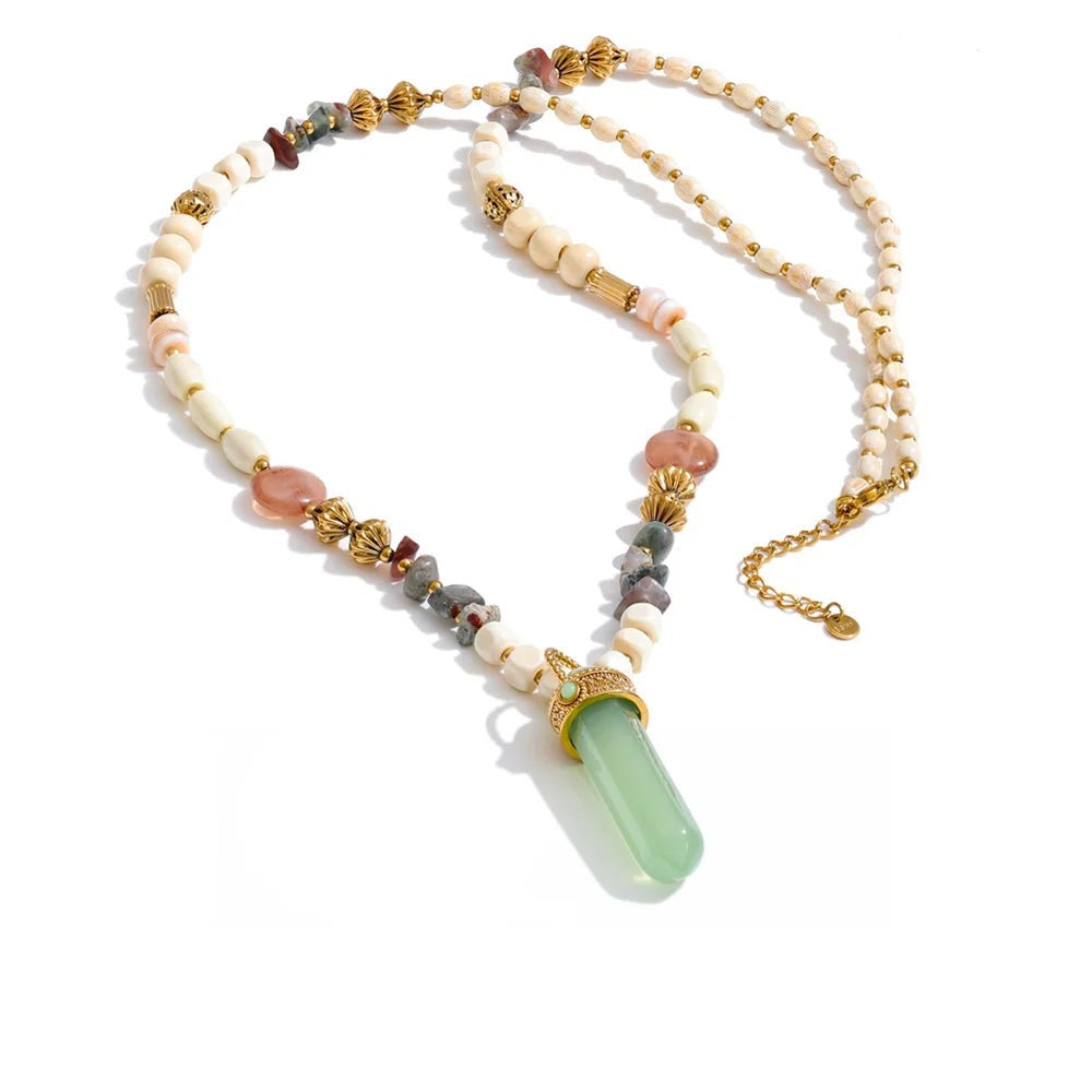Gold-plated stainless steel necklace with natural stone and resin, featuring a large green stone pendant.